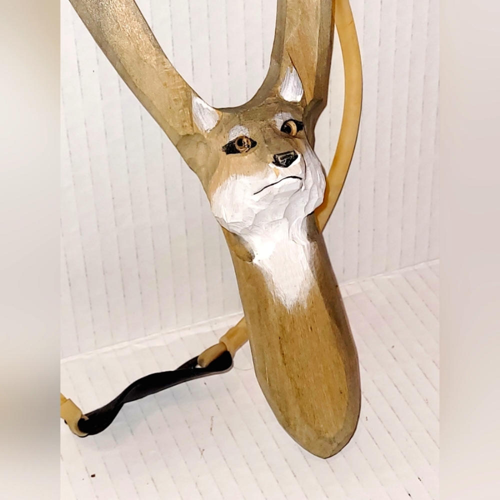 Hand carved wolf sling shot